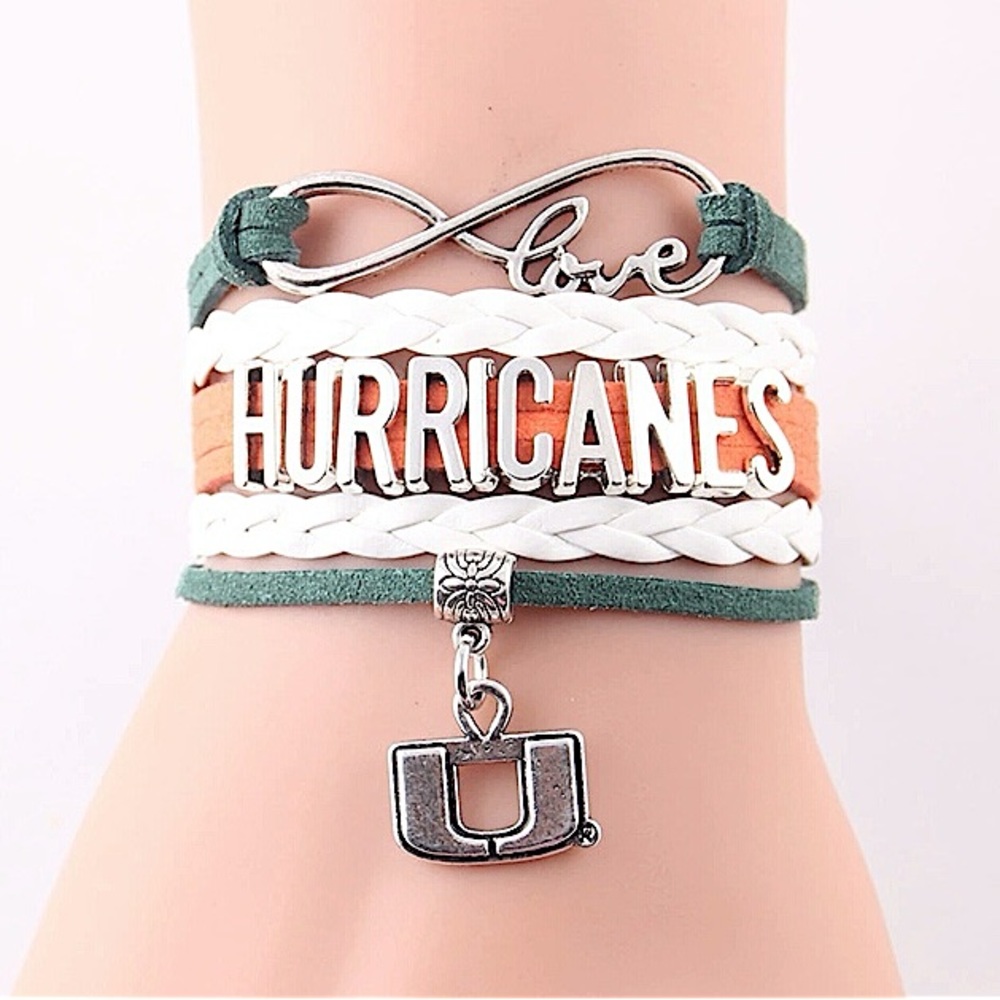 NWT- Infinity Love Hurricane Football with Logo Charm and Lobster Clay